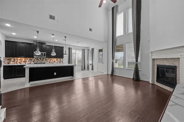 a view of kitchen with furniture and fireplace