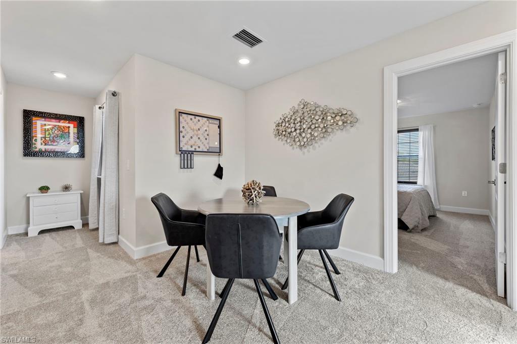 2147 Yellowfin Circle Naples, FL 34114 - Photo 13 of 34 a view of a livingroom with furniture and a couch