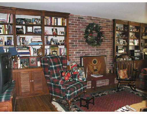 673 Blue Ridge Road Plum, PA 15239 - Photo 6 of 8 Den/Family/Great Room. CHECK OUT THE WONDERFUL BOOKCASES THAT ARE BUILT IN AND THE FLOORING, IT IS TOP NOTCH!! NOTICE HOW UPDATED AND IN WHAT GREAT condition THIS ROOM IS! ALSO, THE DEN SITS OFF THE FAMILY ROOM ADDING THE EXTRA SPACE NEEDED FOR THE OFFICE AT HOME
