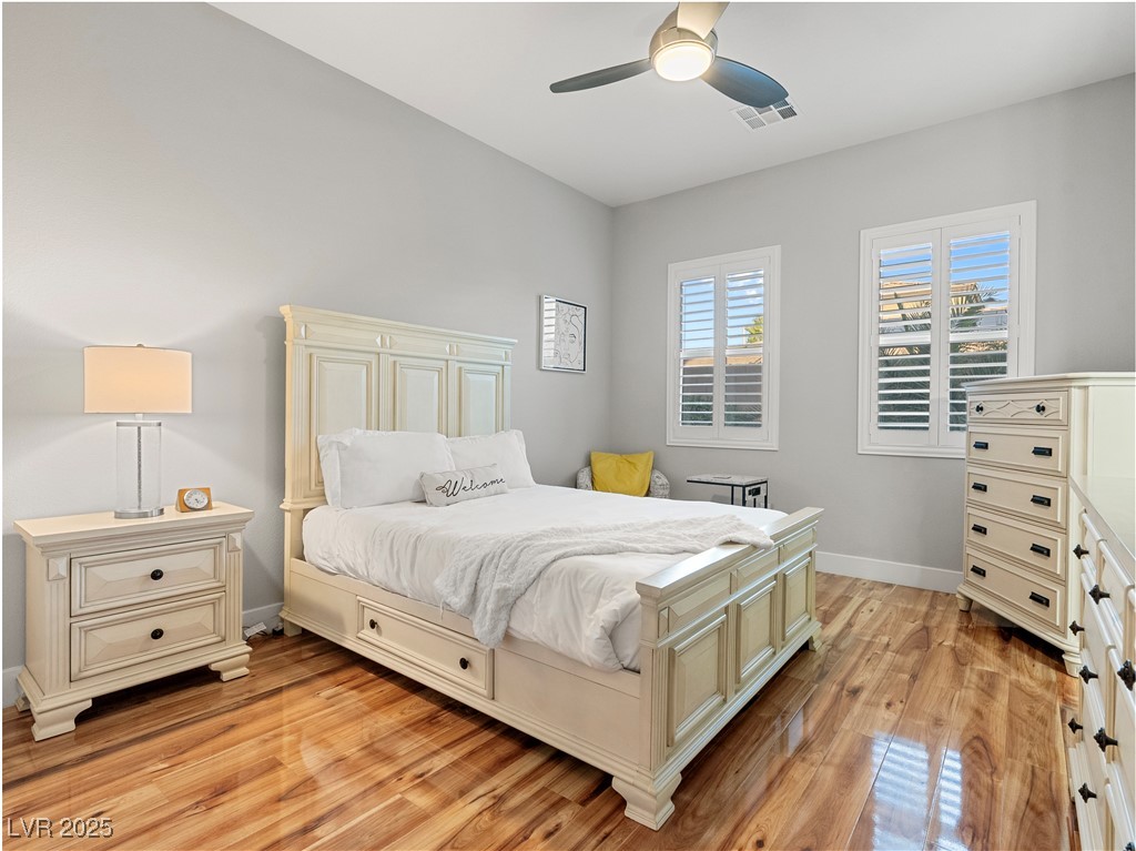 8775 Helena Avenue Las Vegas, NV 89129 - Photo 46 of 72 Bedroom featuring light wood-style flooring and ceiling fan
