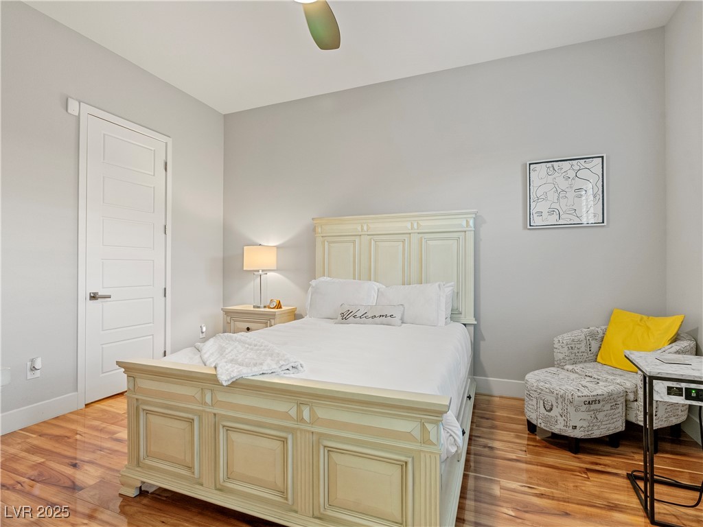 8775 Helena Avenue Las Vegas, NV 89129 - Photo 47 of 72 Bedroom with light wood-type flooring and ceiling fan