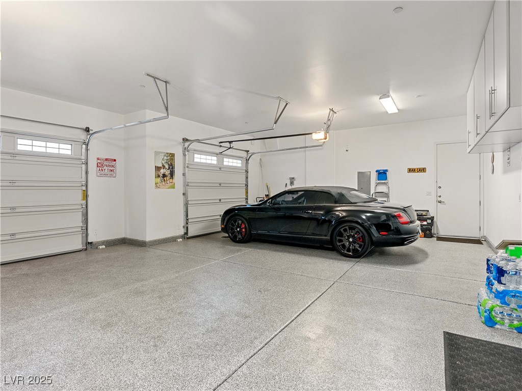 8775 Helena Avenue Las Vegas, NV 89129 - Photo 50 of 72 Garage with baseboards and electric panel