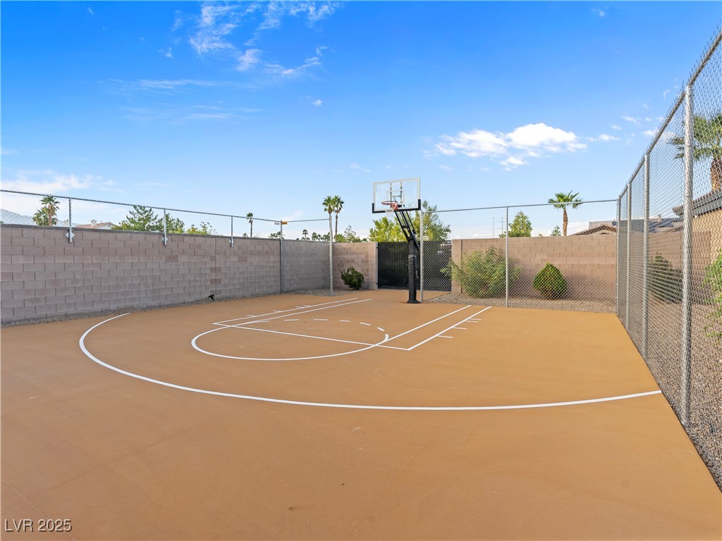 8775 Helena Avenue Las Vegas, NV 89129 - Photo 66 of 72 View of sport court with community basketball court and healthy amount of natural light