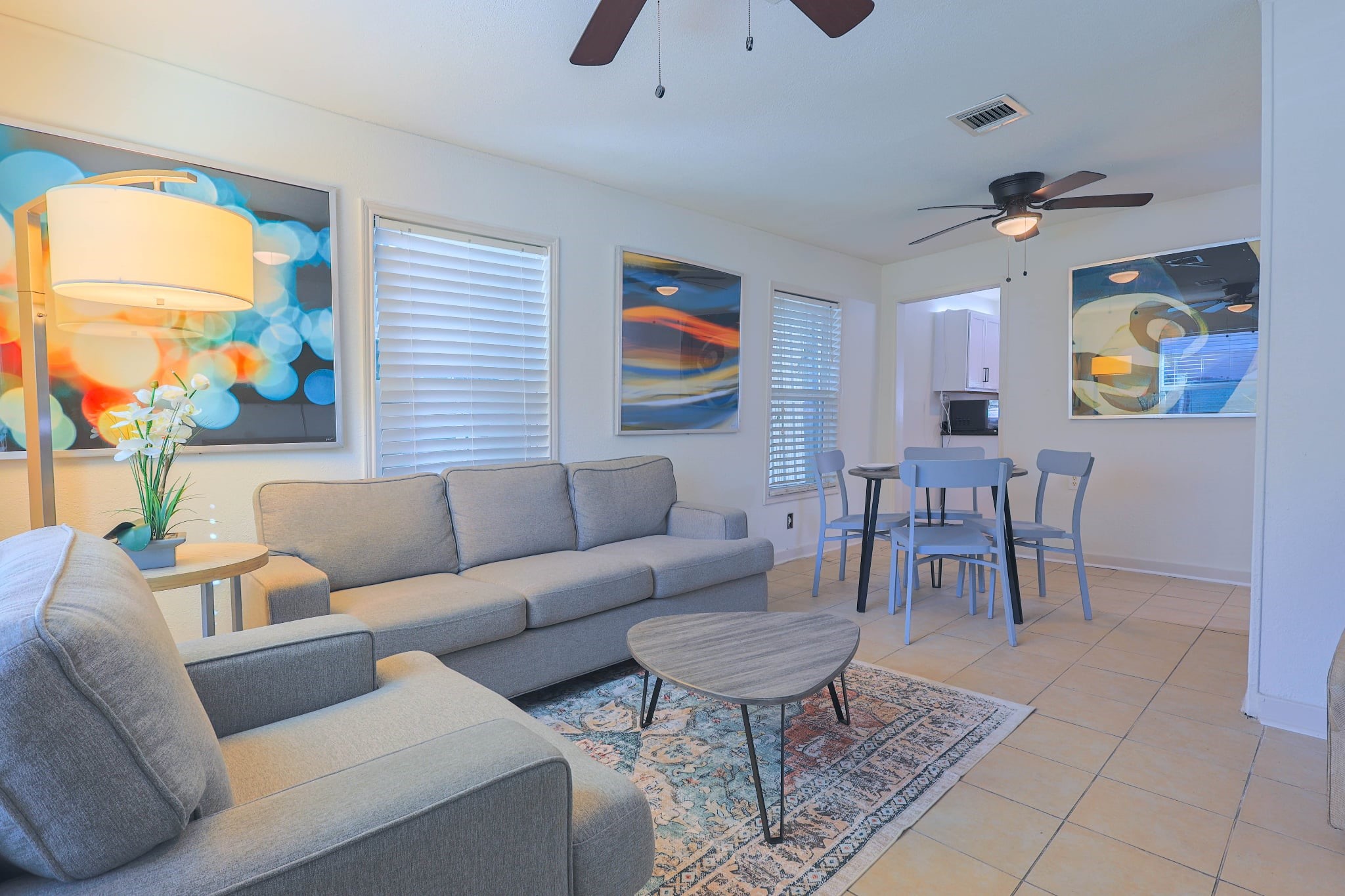 831 Rouse Street Houston, TX 77020 - Photo 16 of 19 a living room with furniture a flat screen tv and a window