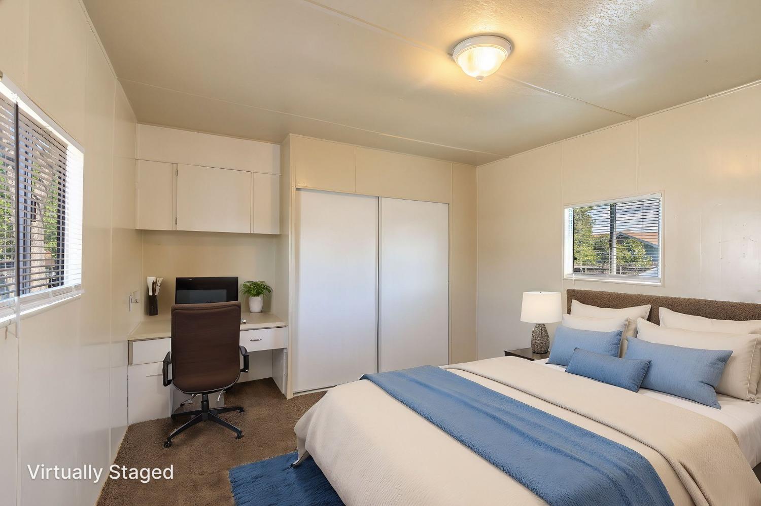 5835 Cherokee Road, Unit 7 Stockton, CA 95215 - Photo 13 of 16 a bedroom with a bed and a window