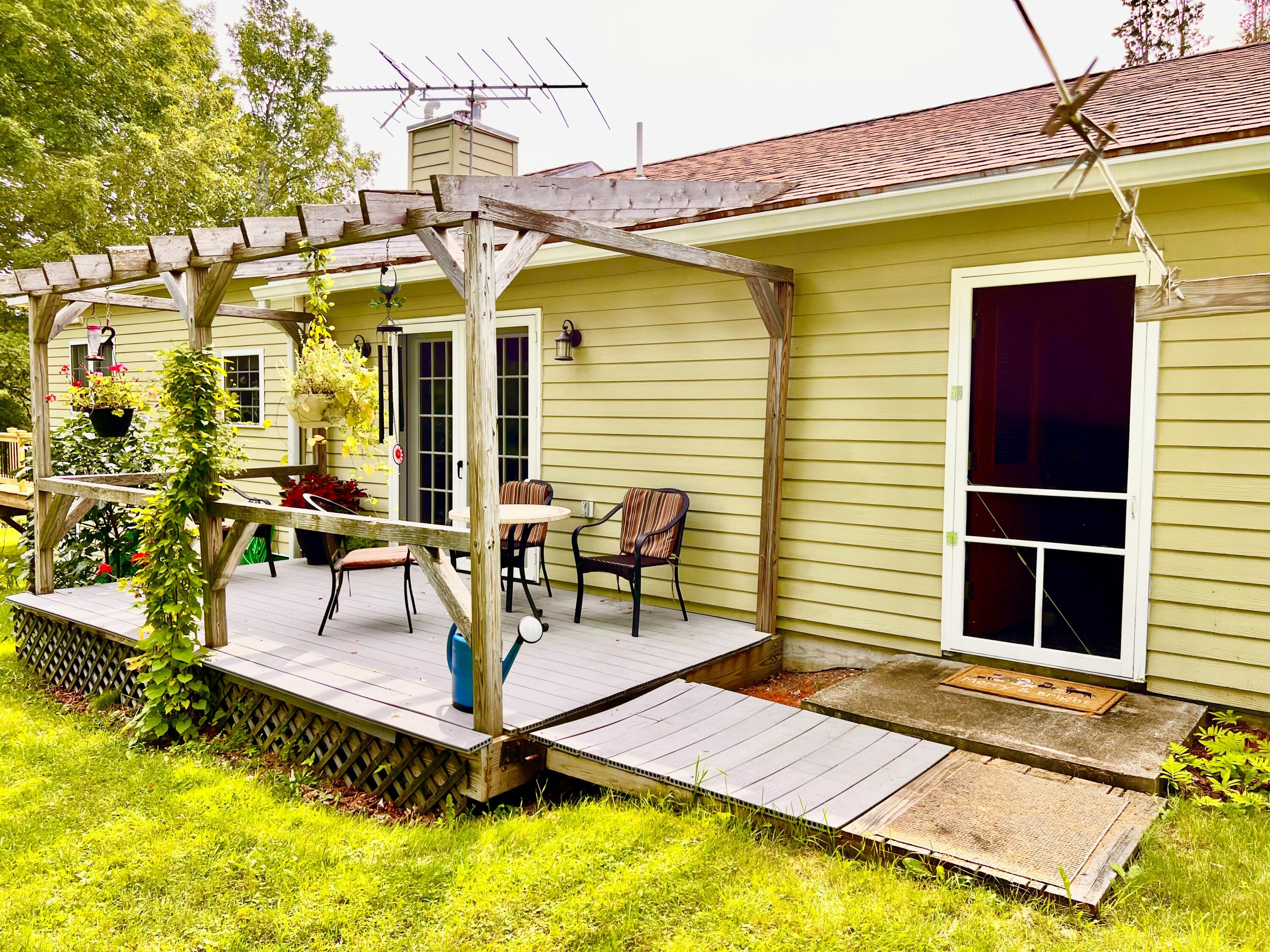24 Lamson Road Sebec, ME 04481 - Photo 64 of 172 Porch w/Pergola on Back Off Great Room