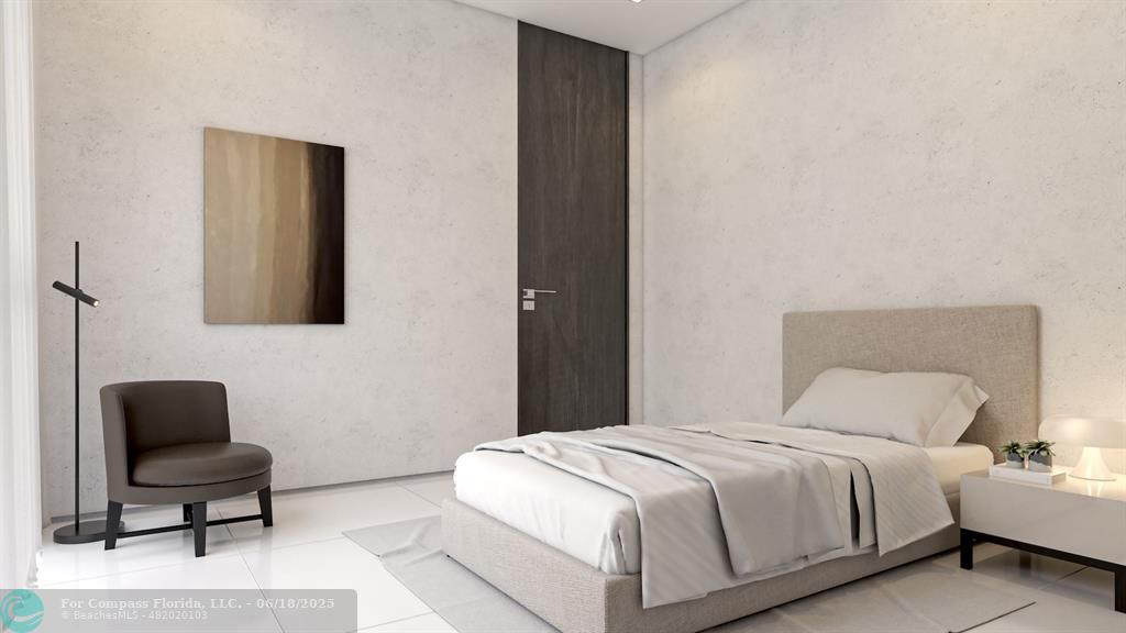 534 Hendricks Isle, Unit 302 Fort Lauderdale, FL 33301 - Photo 11 of 19 a bedroom with a bed and a chair