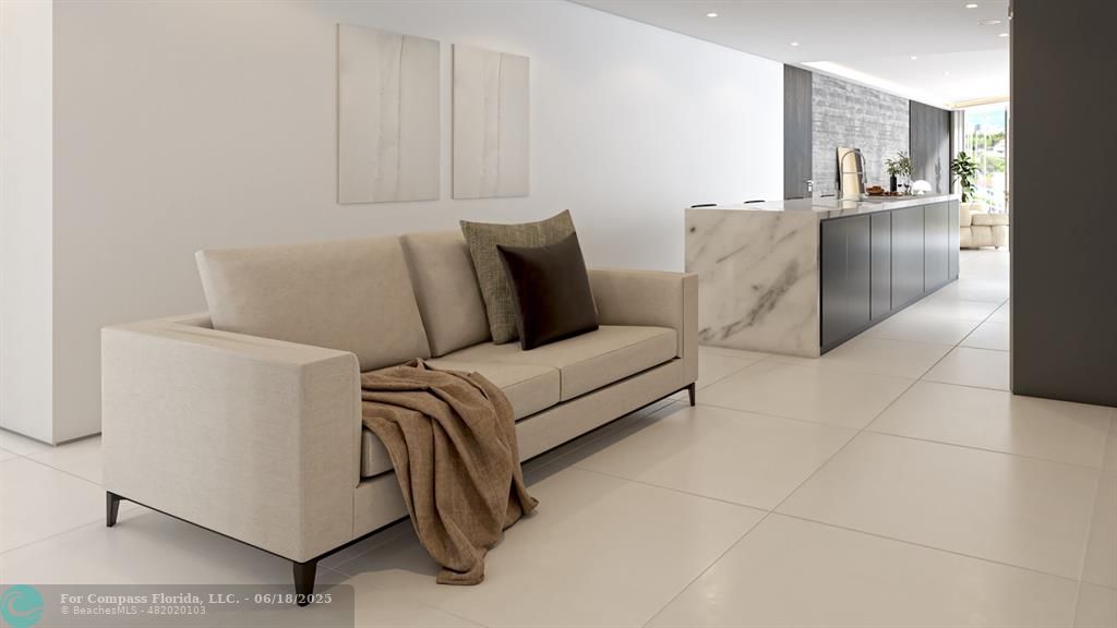 534 Hendricks Isle, Unit 302 Fort Lauderdale, FL 33301 - Photo 12 of 19 a living room with furniture and a open kitchen view