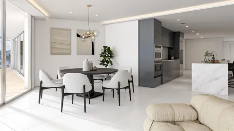 a living room with furniture a dining table and chairs