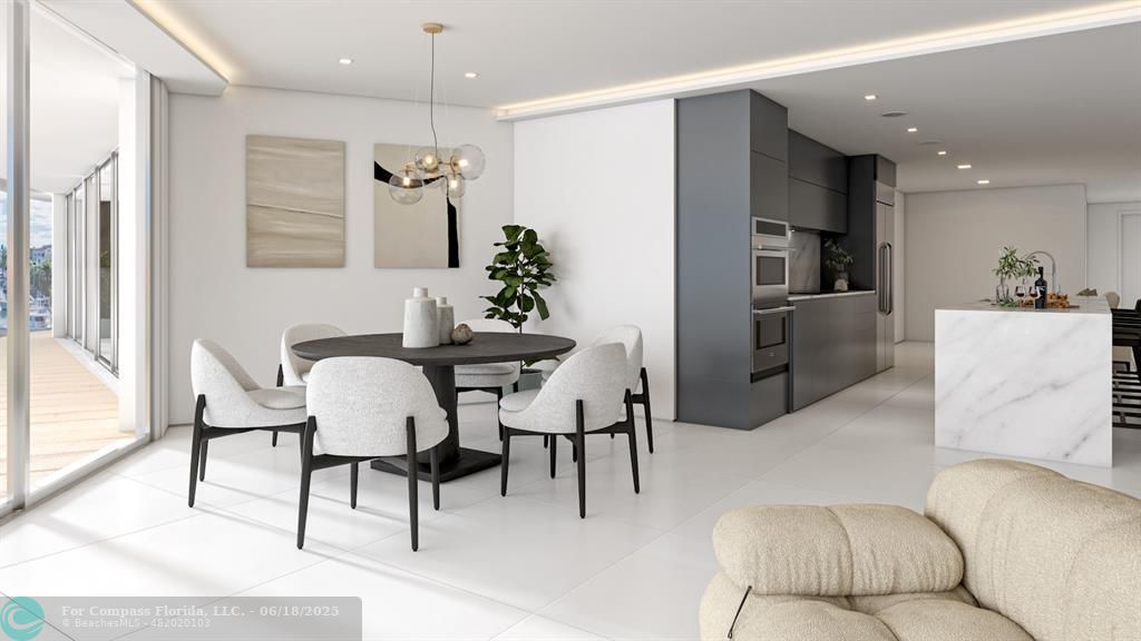 534 Hendricks Isle, Unit 302 Fort Lauderdale, FL 33301 - Photo 9 of 19 a living room with furniture a dining table and chairs