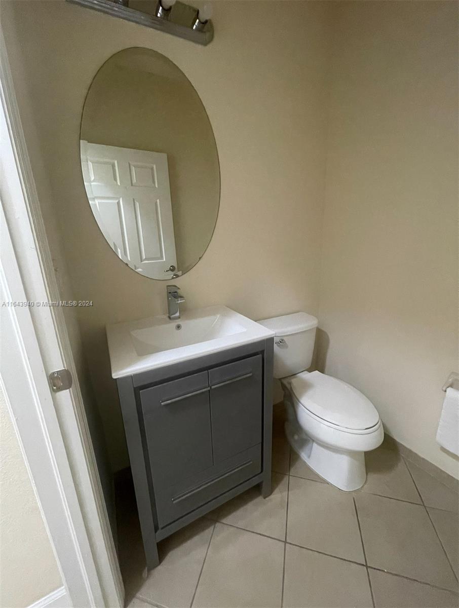 23712 Southwest 117 Place, Unit 23712 Homestead, FL 33032 - Photo 9 of 10 HALF BATH DOWNSTAIR