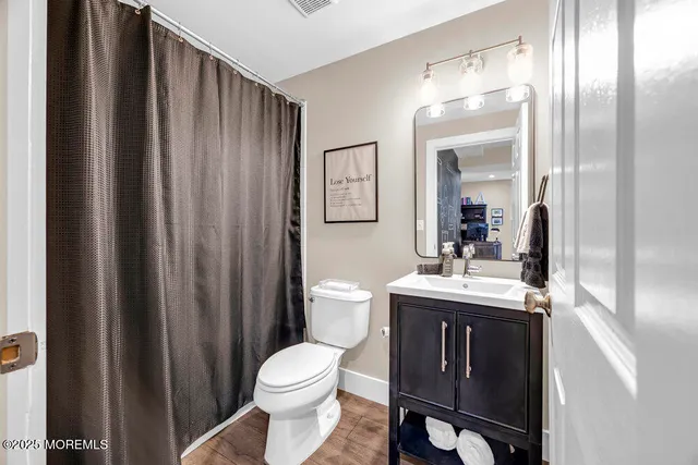 a view of living room with washer and dryer
