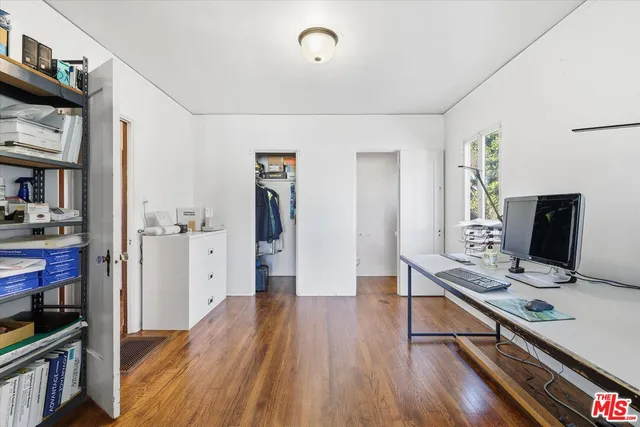 a room with furniture and wooden floor