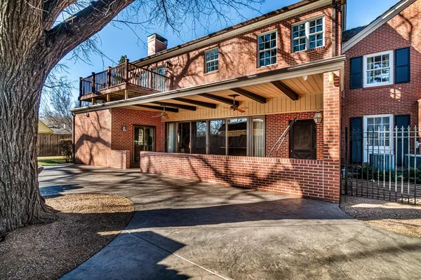 a kitchen with stainless steel appliances a stove sink and microwave