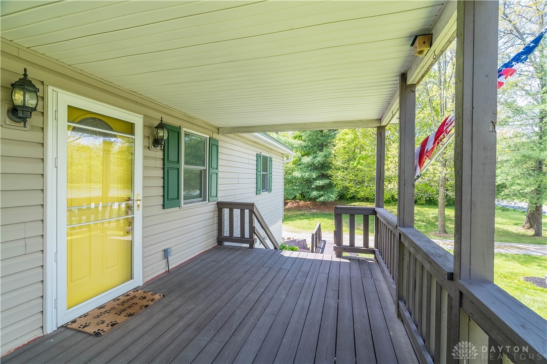 1319 Perry Road Cable, OH 43009 - Photo 3 of 44 Welcome home to this inviting porch, perfect for relaxing and enjoying the outdoors.
