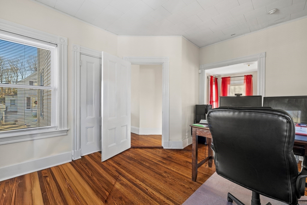 36 Summer Street Holbrook, MA 02343 - Photo 12 of 35 a workspace with wooden floor and a window
