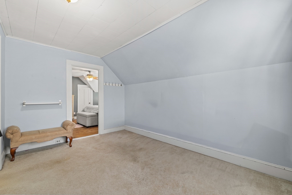 36 Summer Street Holbrook, MA 02343 - Photo 21 of 35 a view of a room with gym equipment and windows