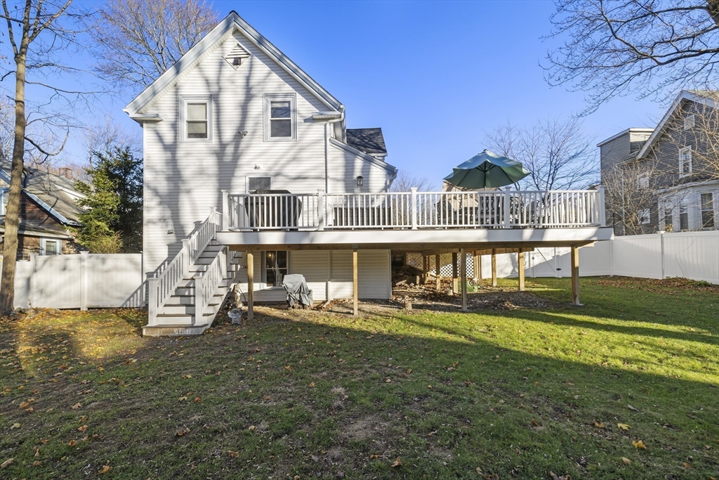 36 Summer Street Holbrook, MA 02343 - Photo 26 of 35 a front view of a house with a yard table and chairs