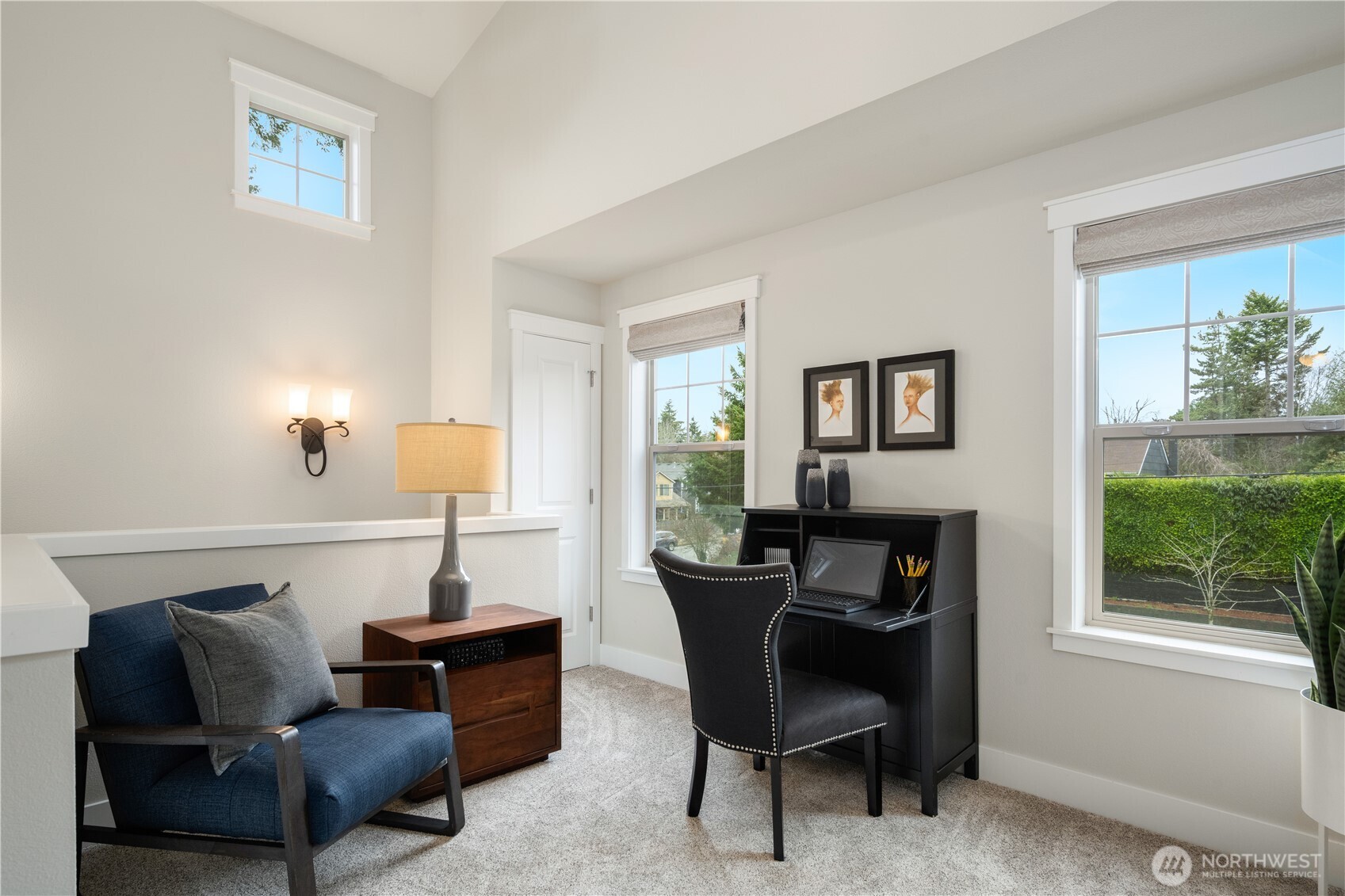 7709 17th Avenue Southwest Seattle, WA 98106 - Photo 17 of 37 a living room with furniture and a window
