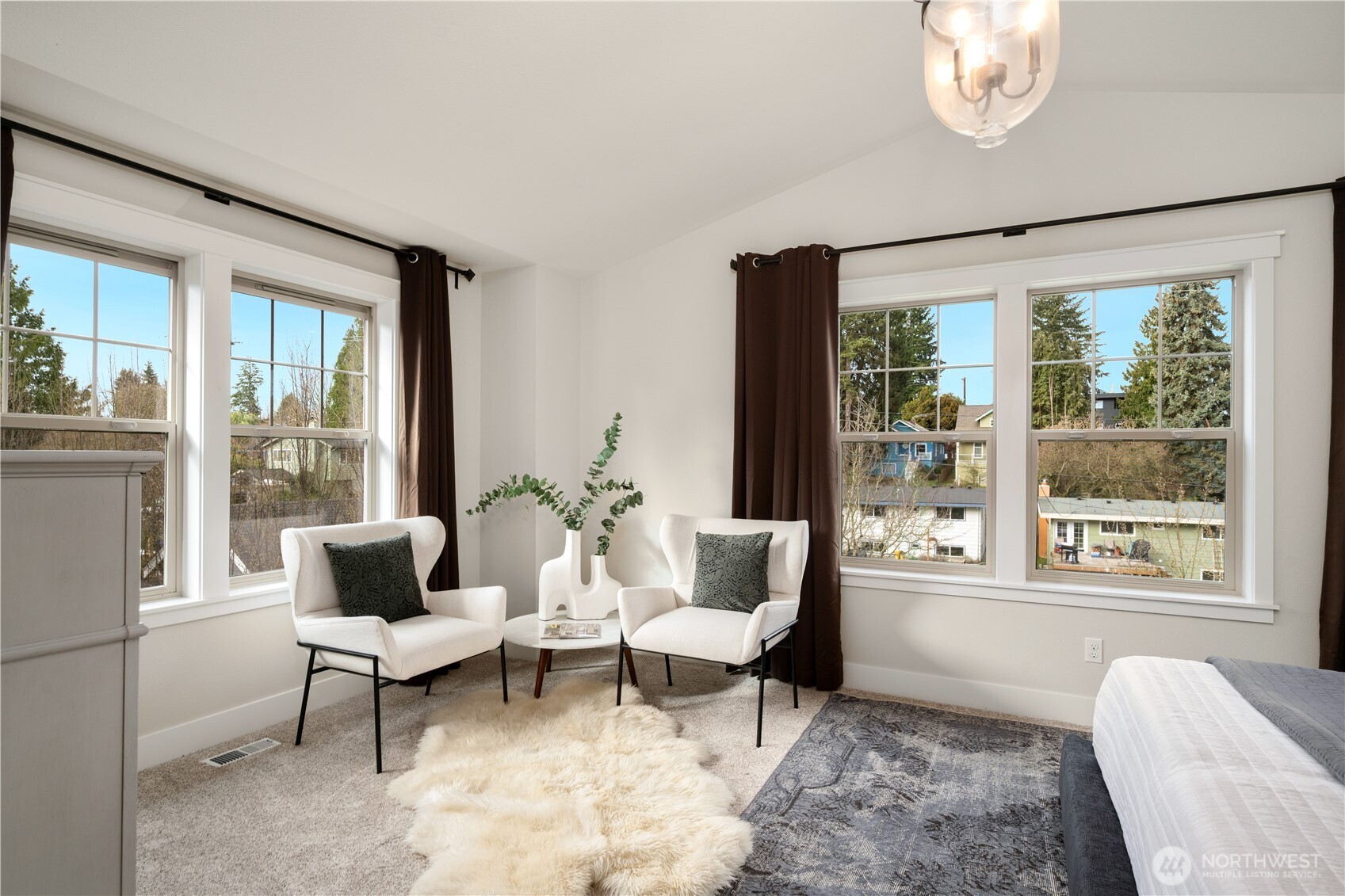 7709 17th Avenue Southwest Seattle, WA 98106 - Photo 18 of 37 a living room with furniture and a large window