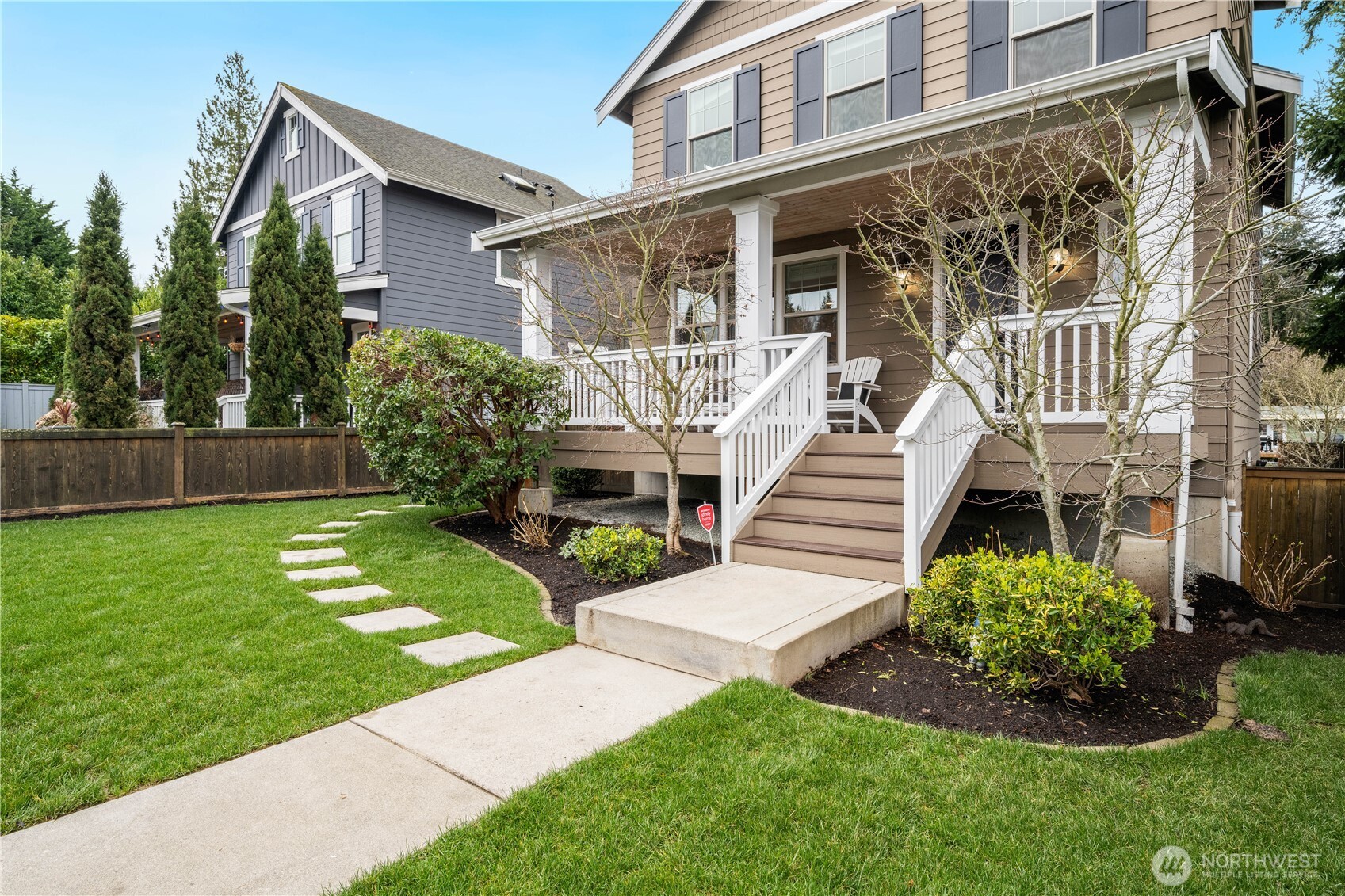 7709 17th Avenue Southwest Seattle, WA 98106 - Photo 2 of 37 a view of a house with a yard