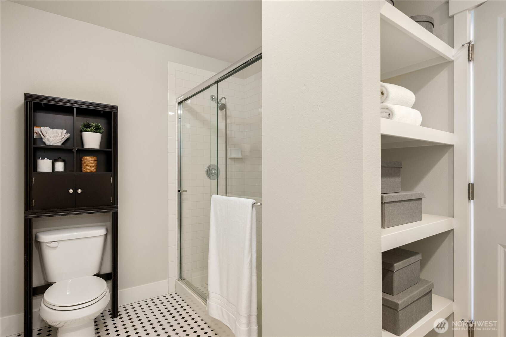 7709 17th Avenue Southwest Seattle, WA 98106 - Photo 23 of 37 a bathroom with a toilet and a shower