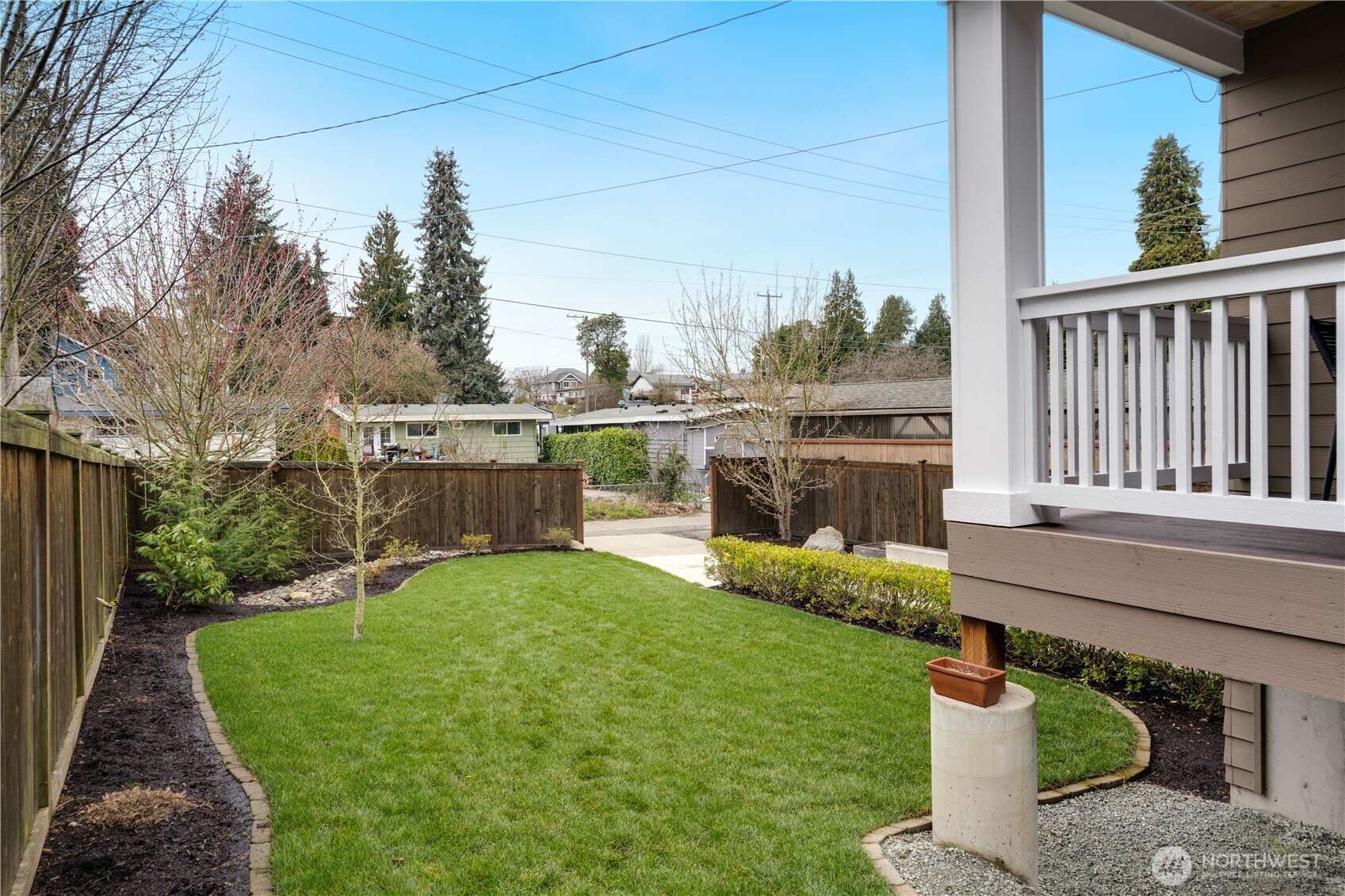 7709 17th Avenue Southwest Seattle, WA 98106 - Photo 34 of 37 a view of a chair and table back yard of the house
