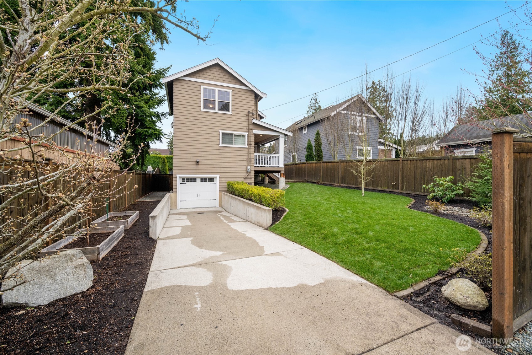 7709 17th Avenue Southwest Seattle, WA 98106 - Photo 37 of 37 a front view of a house with garden
