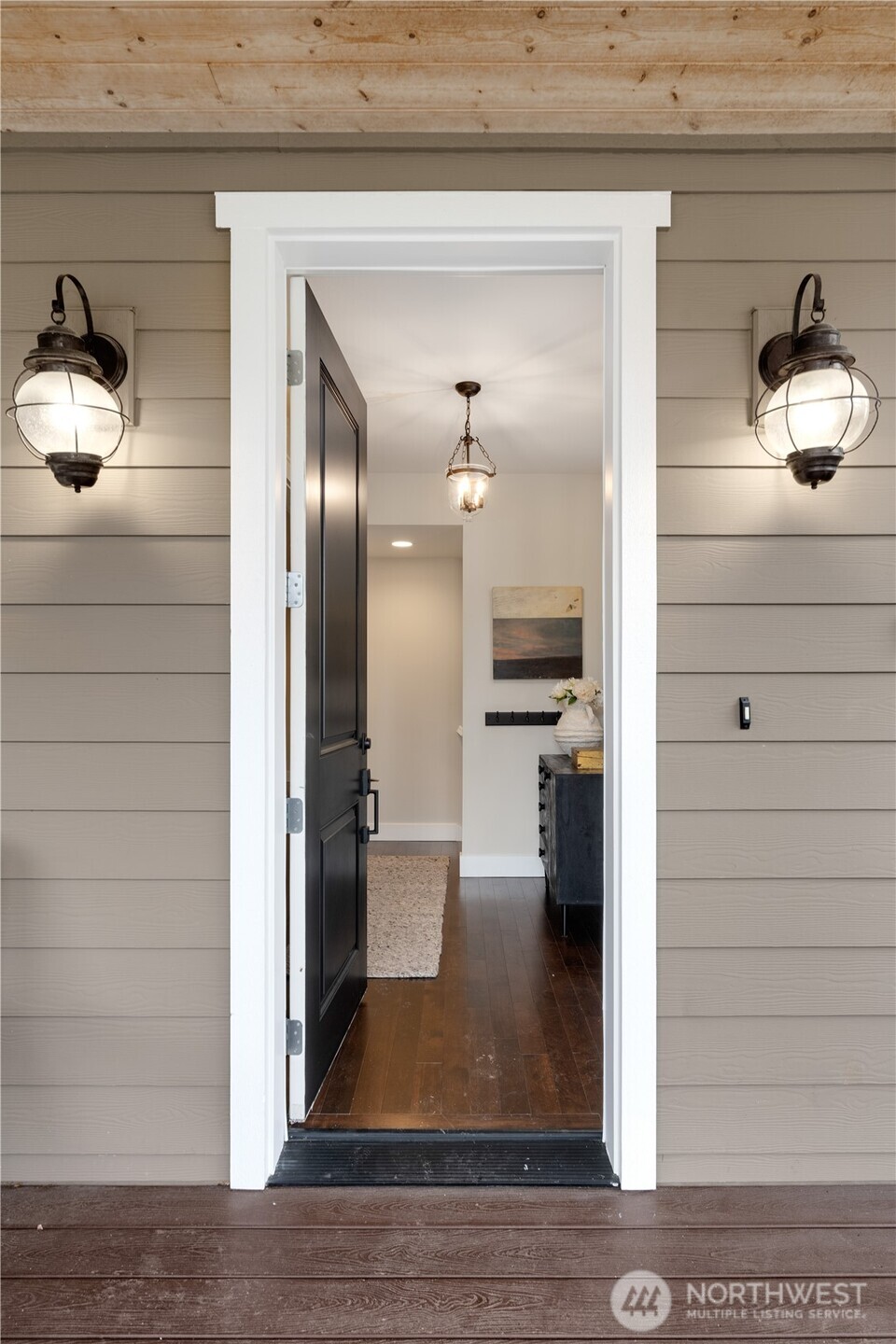 7709 17th Avenue Southwest Seattle, WA 98106 - Photo 5 of 37 a view of a hallway and a living room