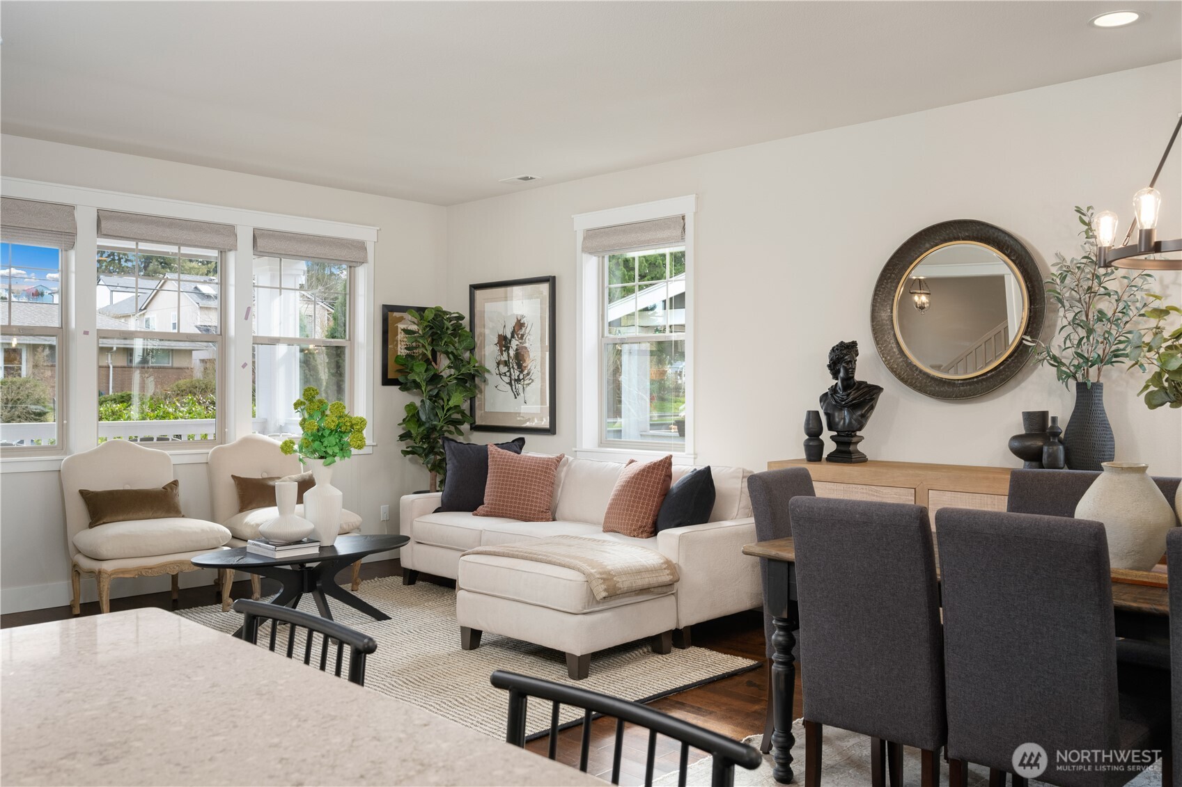 7709 17th Avenue Southwest Seattle, WA 98106 - Photo 8 of 37 a living room with furniture and a large window
