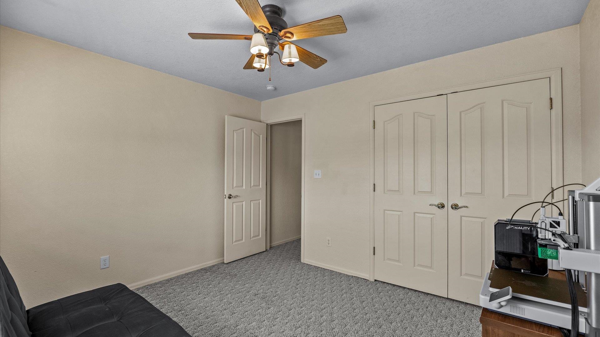475 Los Broncos Road Whitewater, CO 81527 - Photo 20 of 41 a view of a livingroom with a chandelier fan
