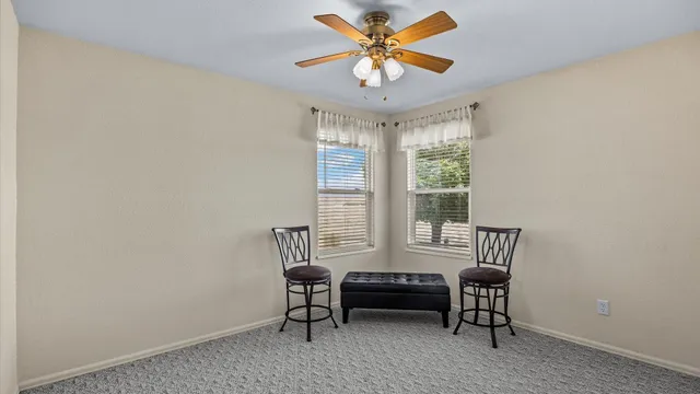 a view of a livingroom with furniture