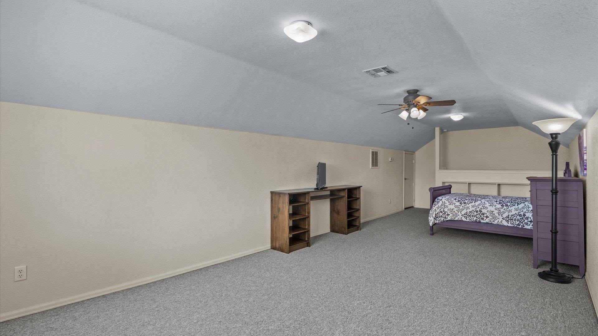 475 Los Broncos Road Whitewater, CO 81527 - Photo 24 of 41 a living room with furniture and a chandelier