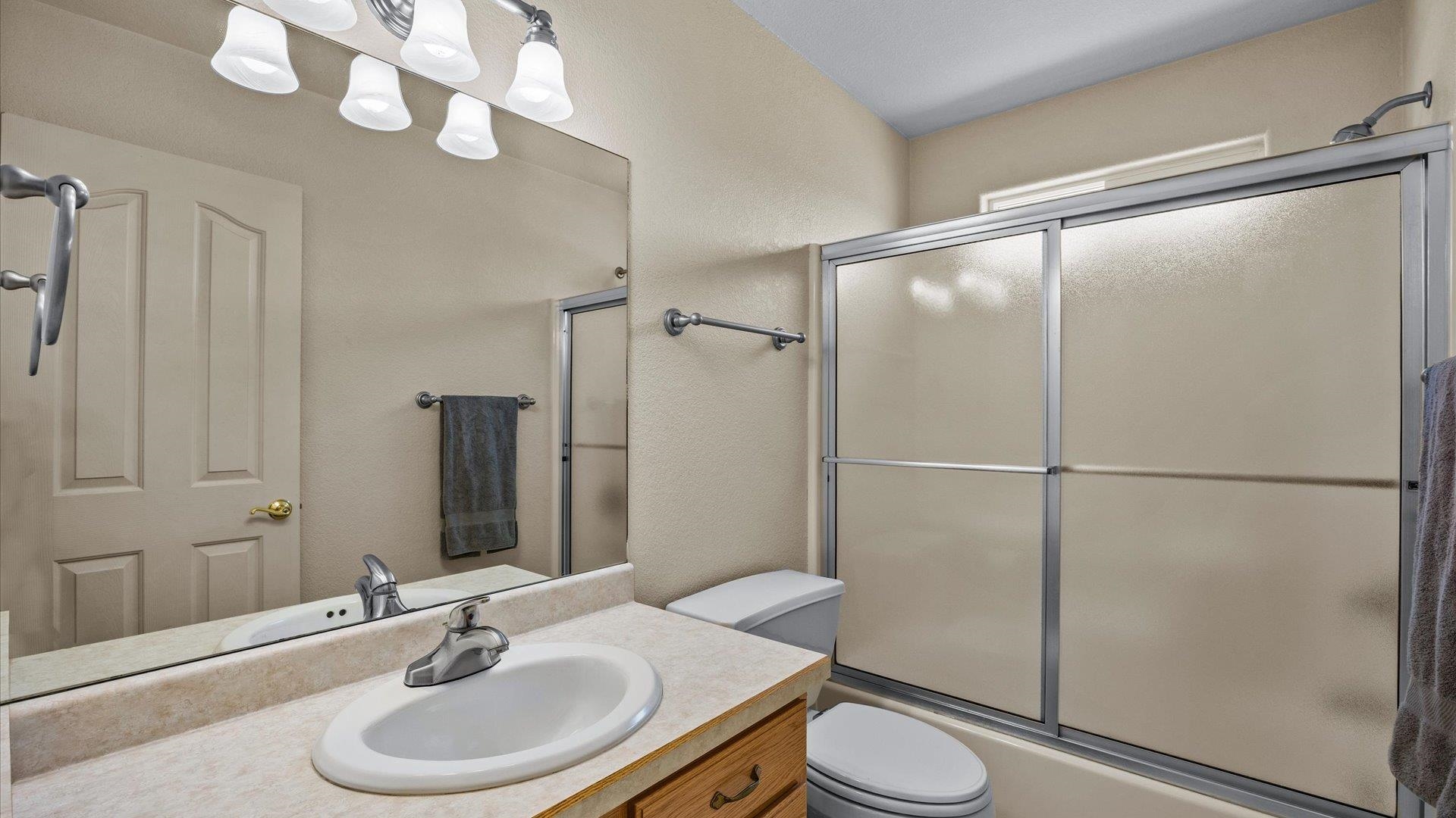 475 Los Broncos Road Whitewater, CO 81527 - Photo 25 of 41 a bathroom with a sink toilet and shower