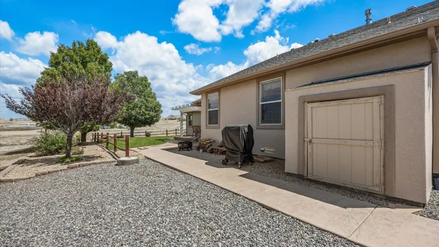 a house view with a backyard space