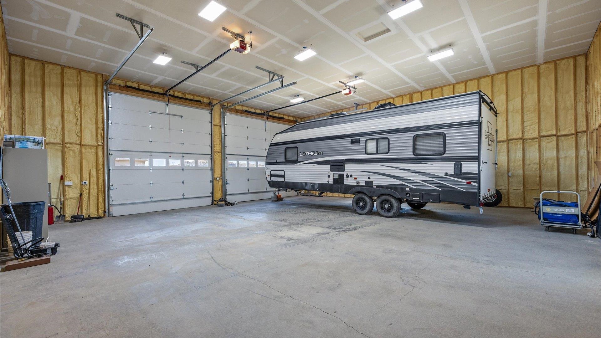 475 Los Broncos Road Whitewater, CO 81527 - Photo 32 of 41 a view of a garage with furniture