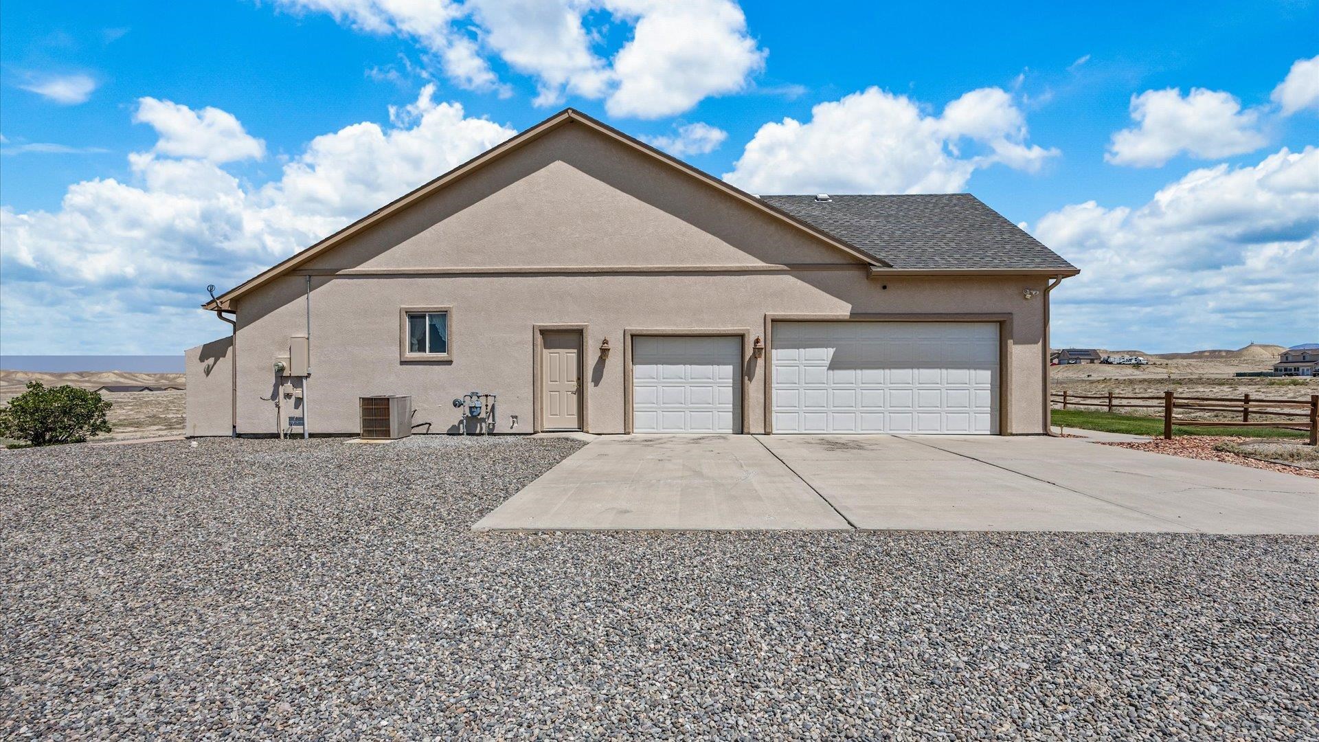 475 Los Broncos Road Whitewater, CO 81527 - Photo 5 of 41 a view of a house with a yard
