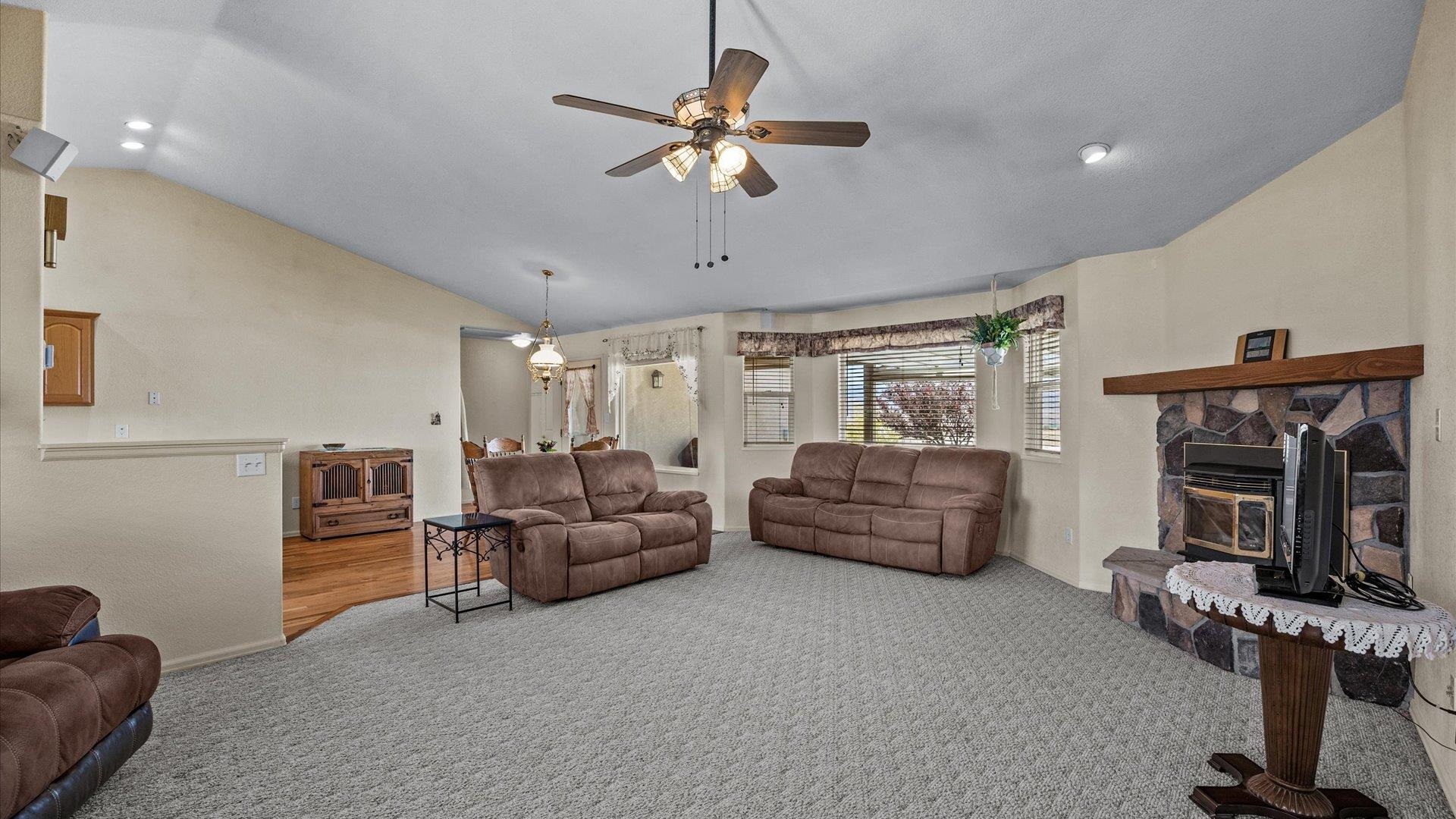 475 Los Broncos Road Whitewater, CO 81527 - Photo 6 of 41 a living room with furniture and a flat screen tv