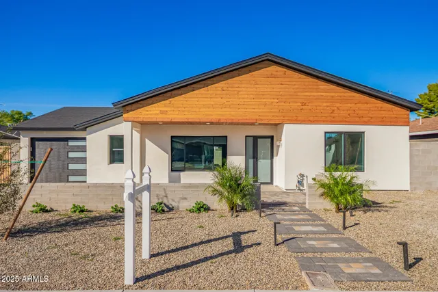 a front view of a house with a porch