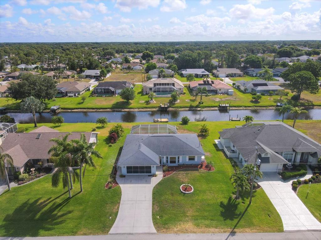 161 Bunker Road Rotonda West, FL 33947 - Photo 1 of 1 Aerial views overlooking canal