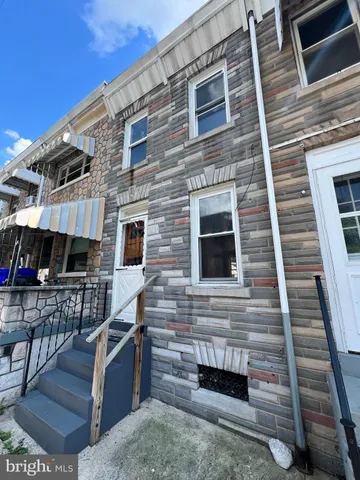 a view of house with outdoor space