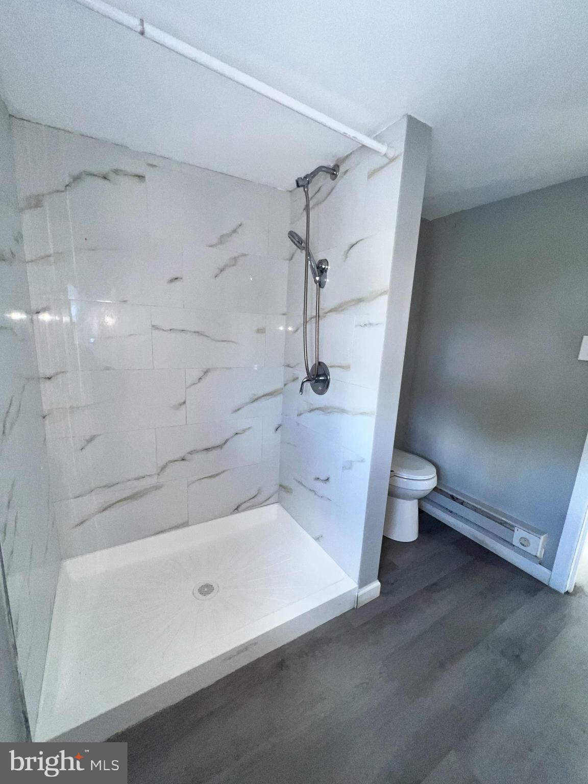 1264 Muhlenberg Street Reading, PA 19602 - Photo 5 of 16 a bathroom with a bathtub and toilet