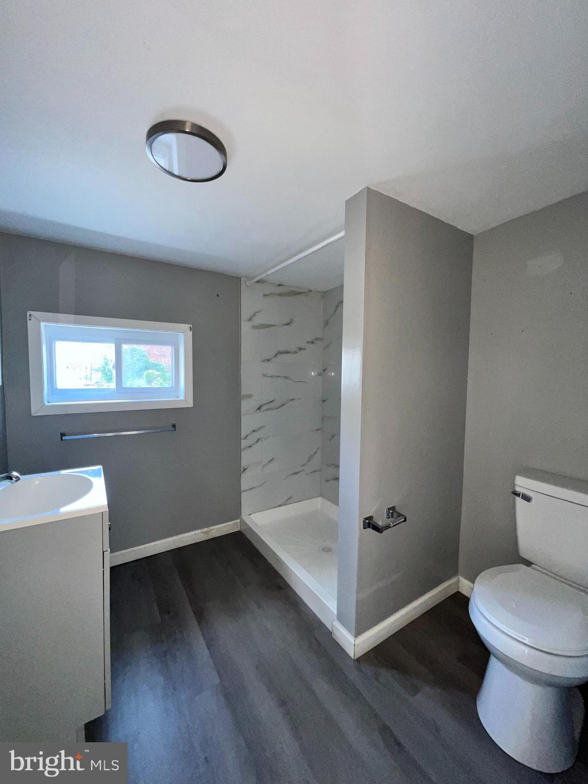 1264 Muhlenberg Street Reading, PA 19602 - Photo 6 of 16 a bathroom with a toilet and a shower
