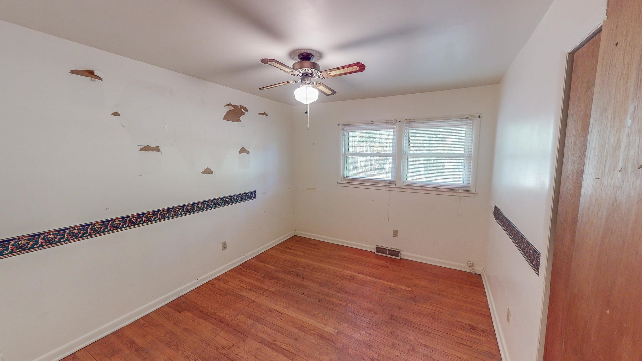 624 Frank Street Roxboro, NC 27573 - Photo 16 of 22 a view of an empty room with a window