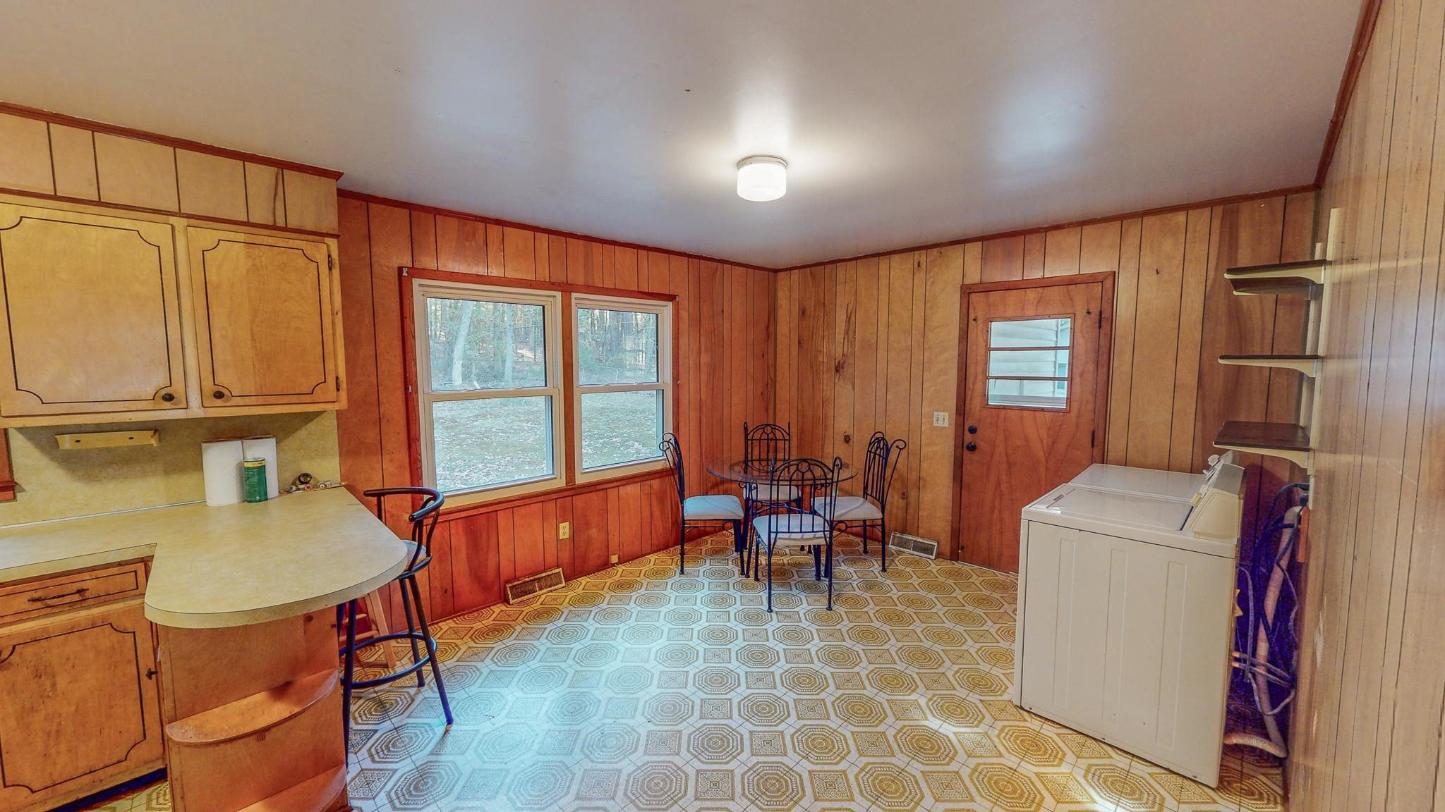 624 Frank Street Roxboro, NC 27573 - Photo 4 of 22 a living room with furniture a window and a dining table