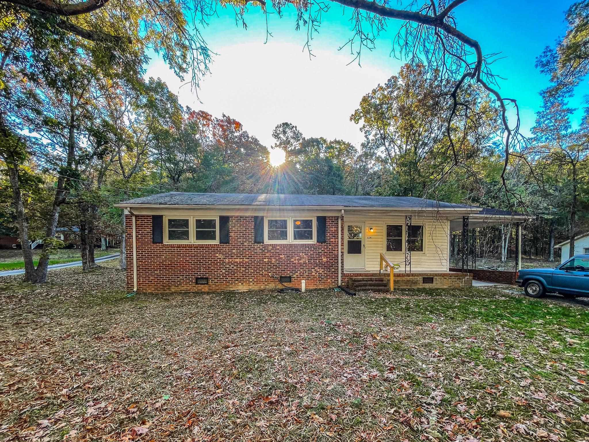624 Frank Street Roxboro, NC 27573 - Photo 8 of 22 a house that is sitting in the forest