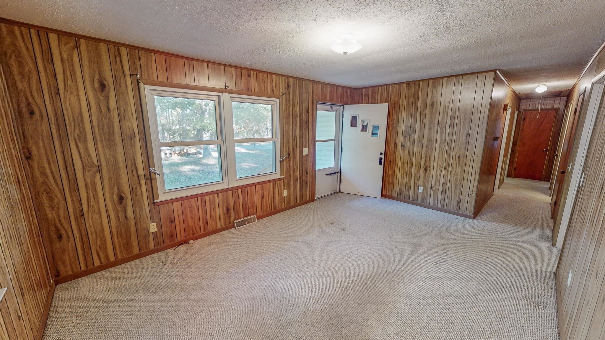 624 Frank Street Roxboro, NC 27573 - Photo 10 of 22 a view of an empty room with a window