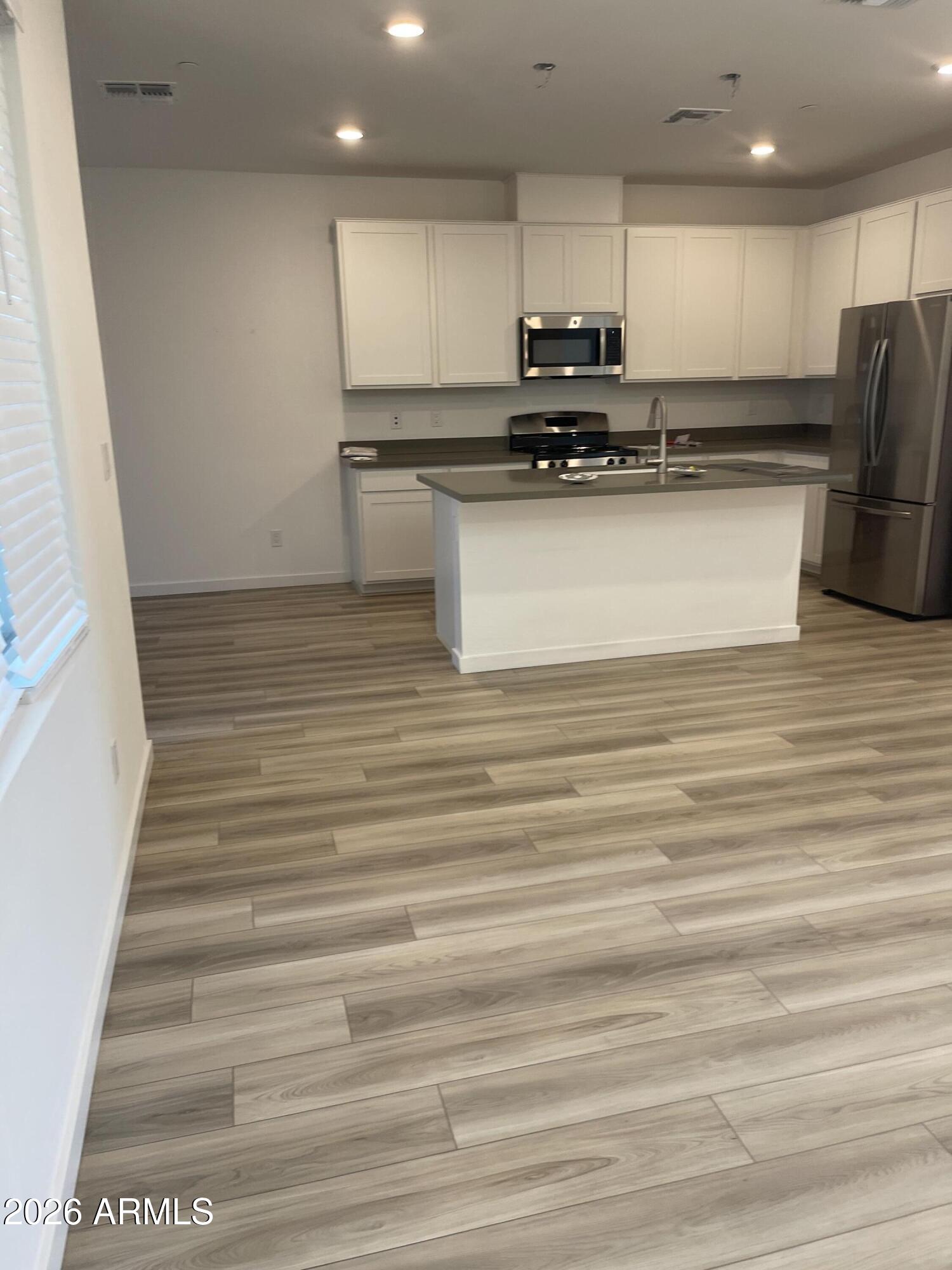 4536 South Riata Street, Unit 102 Gilbert, AZ 85297 - Photo 6 of 19 20260901_191947780_iOS