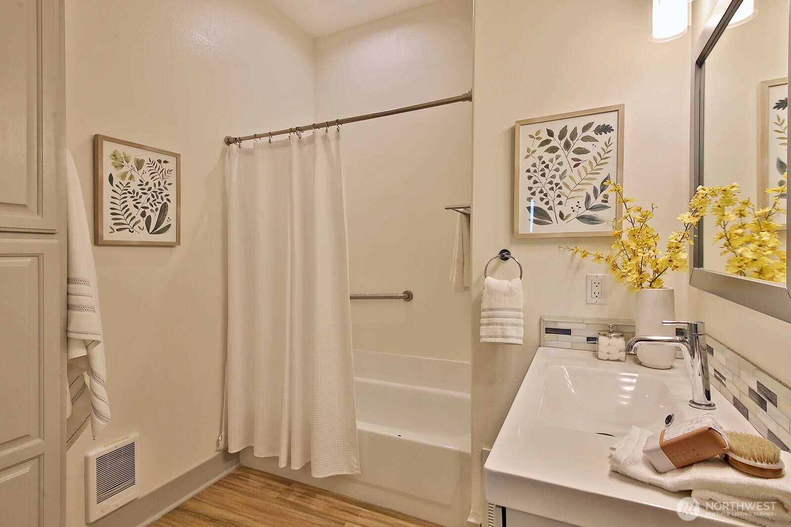 4694 Wrightsman Place Clinton, WA 98236 - Photo 31 of 38 a bathroom with a sink a mirror and a shower