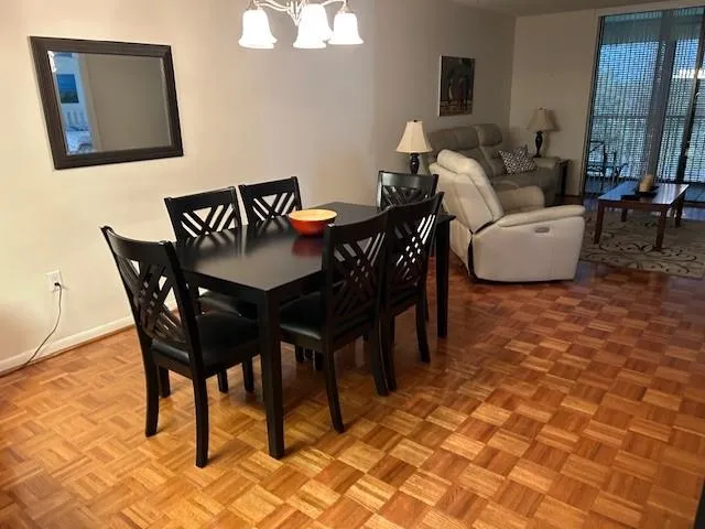 a view of a dining room with furniture